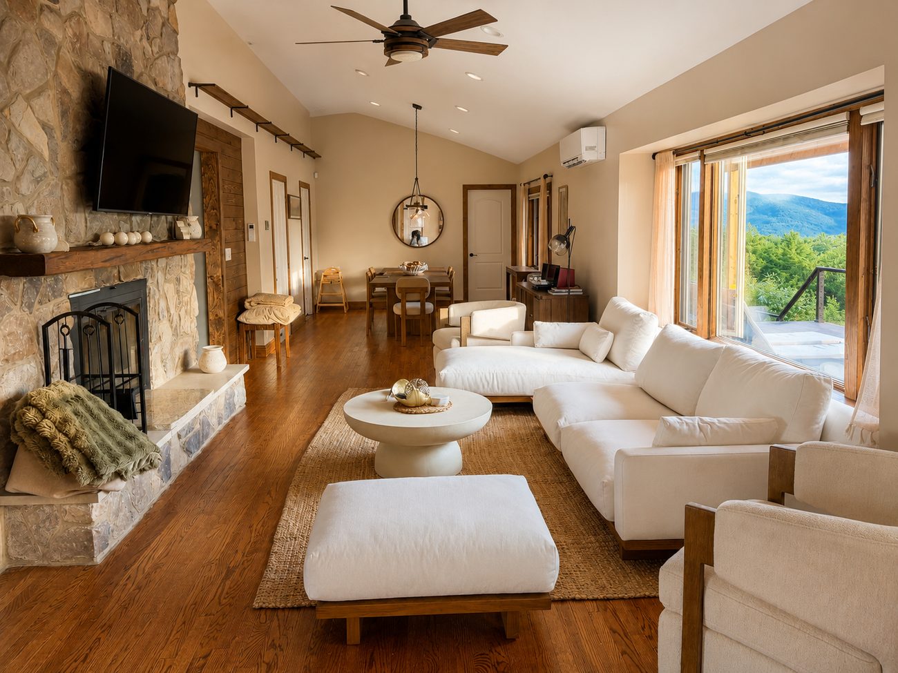 The living room with stone fireplace